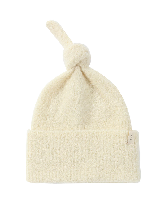 boucle baby knotted hat. milk